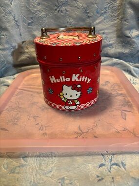 Hello Kitty Round Tin Zippered Purse with Floral Accents